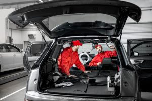 car service workers disassembling car interior 2021 11 12 22 21 39 utc 1024x683 1